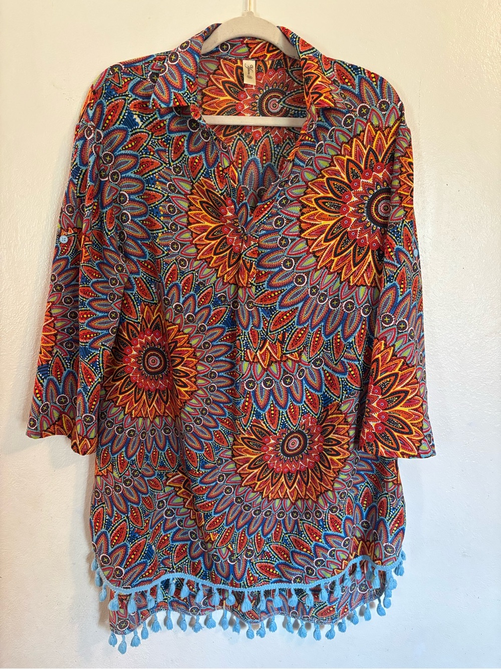 Sunburst Floral Multicolor V-Neck Tunic with Tassel Hem